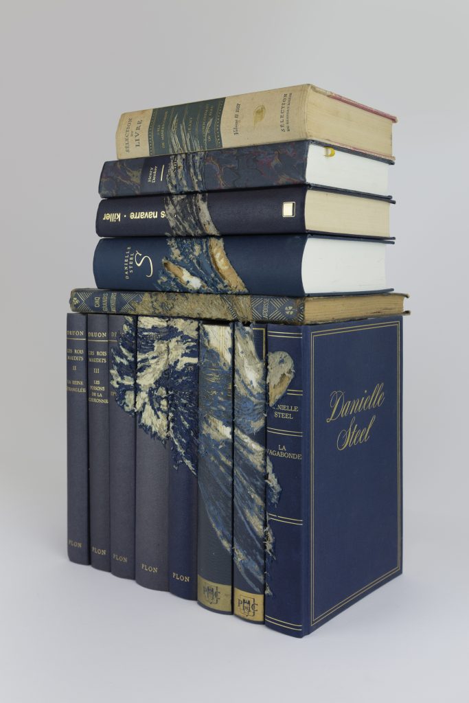Untitled(Roller #1), 38x24x18cm, carved on old books, 2022